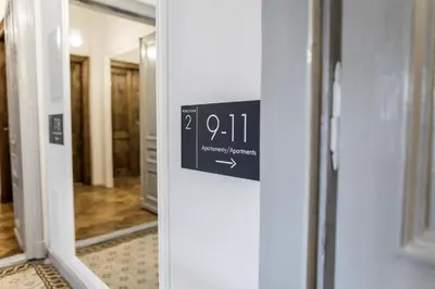 a sign on the door of a room at CracWoW K8 No.9 Apartment in Kraków