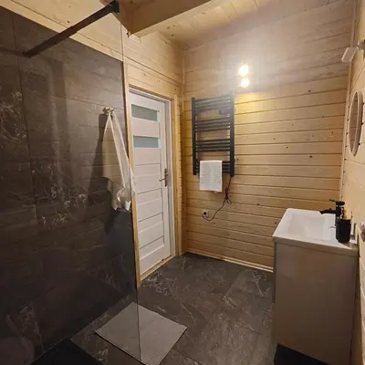 a bathroom with a shower and a sink at beskid.house2 in Spytkowice