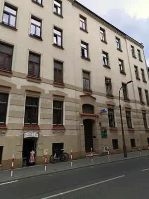 a building with a bike parked in front of it at Apartment A3 in downtown of Krakow in Kraków