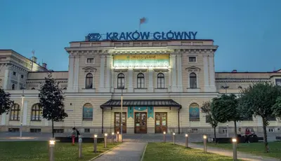 a large building with a sign on top of it at Air-conditioned apartment in the city center, Old Town in Kraków