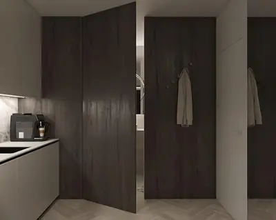 a bedroom with a large white bed and a kitchen at Prestiżowy apartament A free parking in Kraków