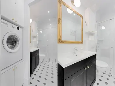 a white bathroom with a sink and a washing machine at Green & Gold Studio near Vistula by Tyzenhauz in Kraków