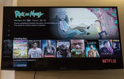 a tv screen with a bunch of movies on it at Quiet & Cosy Apt in the Heart of Old Cracow in Kraków