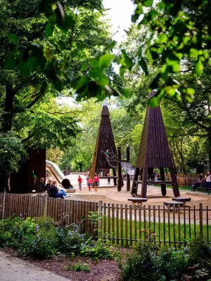 a park with a playground with a play structure at Green view apartment / Kochanowskiego in Kraków