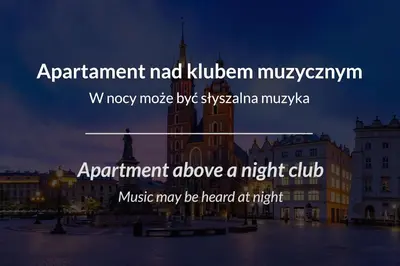 a bedroom with a wooden bed with two pillows on it at Bracka 4 Apartament in Kraków