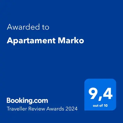 a blue screen with the text awarded to apartment market marquez at Apartament Marko in Zator