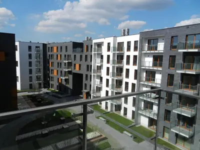 a view from a balcony of apartment buildings at White Pearl Apartment in Kraków