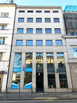 an office building with the doors open on a street at Modern House in Old Town Numero 8 in Kraków